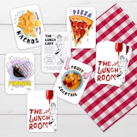 a set of lunch room cards on a red and white checkered tablecloth